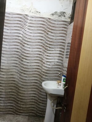 Bathroom in 3 BHK Builder Floor at Guru Nanak Enclave, Dhakoli – for Sale
