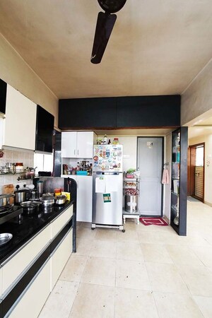 Kitchen in 2 BHK Apartment at Hingne Khurd – for Sale