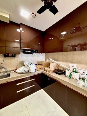 Kitchen in 2 BHK Apartment at Dosti West County, Balkum Pada – for Rent