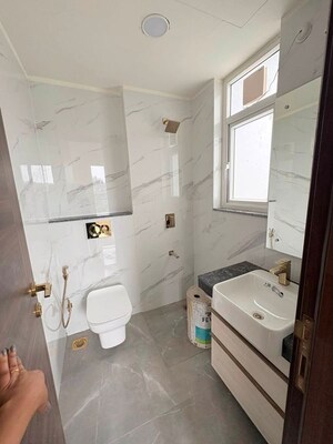 Bathroom in 3 BHK Apartment at Smart World Orchard, Sector 61 – for Sale