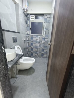 Bathroom in 2 BHK Apartment at Veena Smart Homes, Kandivali West – for Rent