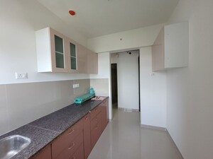 Kitchen in 1 BHK Apartment at Puranik City Reserva, Ghodbunder Road – for Rent
