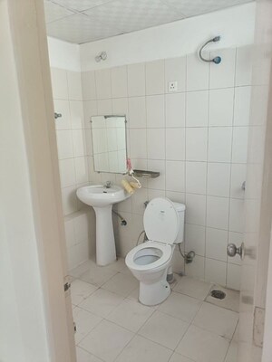 Bathroom in 2 BHK Apartment at Adore Happy Homes Grand, Sector 85 – for Sale