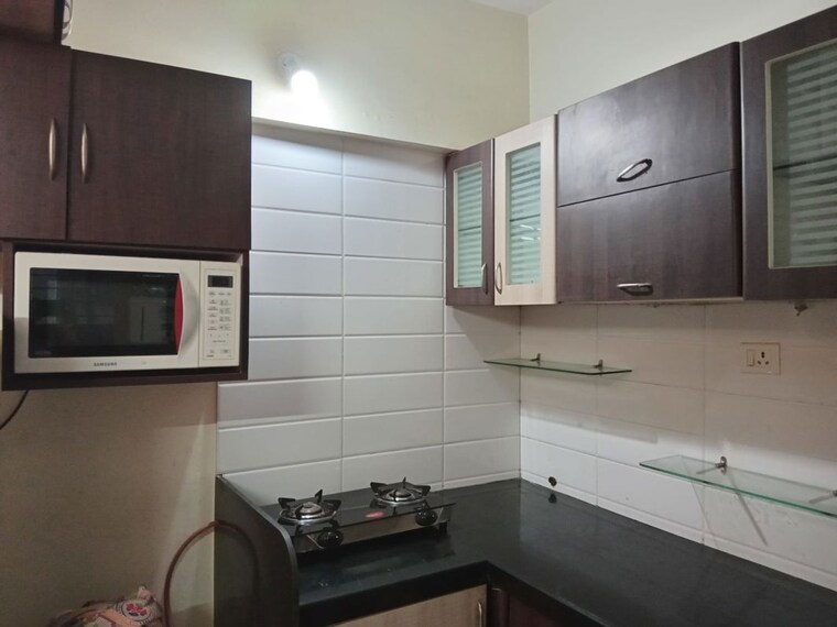 Kitchen, simpli-city 2 Bedroom 850 Sq.Ft. Apartment In Handewadi Pune 10580372