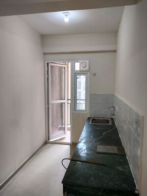 Building Lobby in 2 BHK Apartment at Conscient Habitat 102, Sector 102 – for Rent
