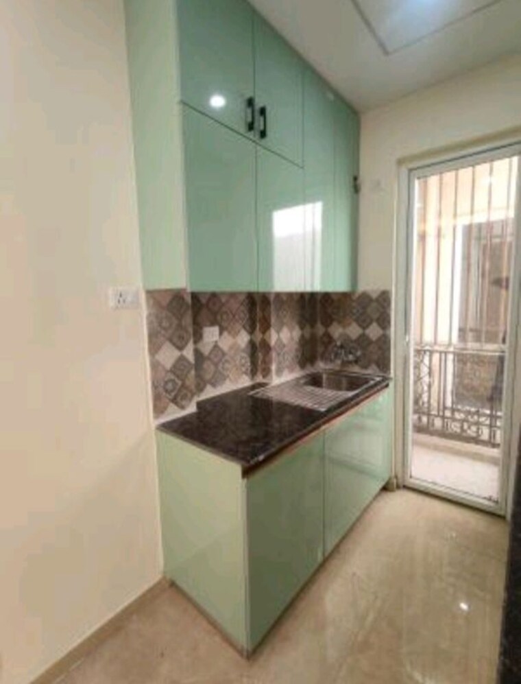 Kitchen, signature-global-park-4-and-5 3 Bedroom 1181 Sq.Ft. Builder Floor In Sohna Sector 36 Gurgaon 10580509