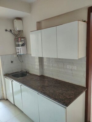 Kitchen in 3.5 BHK Apartment at Sunworld Arista, Sector 168 – for Rent