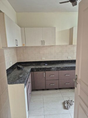 Kitchen in 2 BHK Apartment at Mahindra Aura, Sector 110a – for Sale