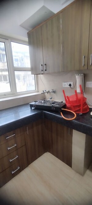 Kitchen in Studio Apartment at DLF Capital Greens Phase I And II, Moti Nagar – for Rent