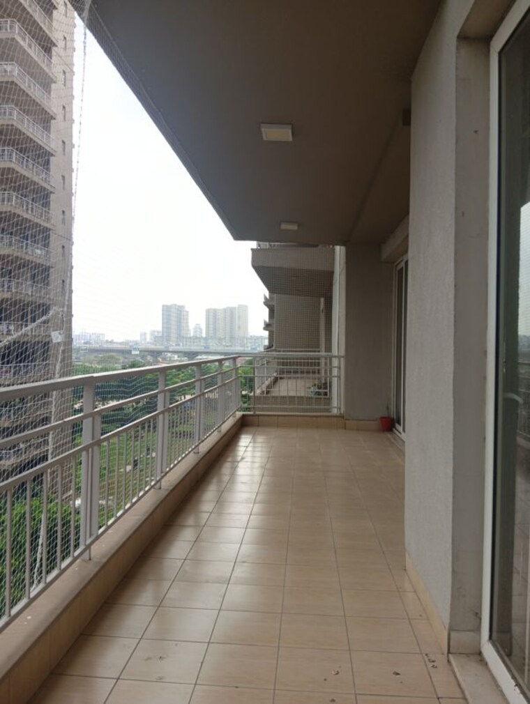 Balcony, puri-diplomatic-greens-phase-i 3 Bedroom 1700 Sq.Ft. Apartment In Sector 111 Gurgaon 10580587