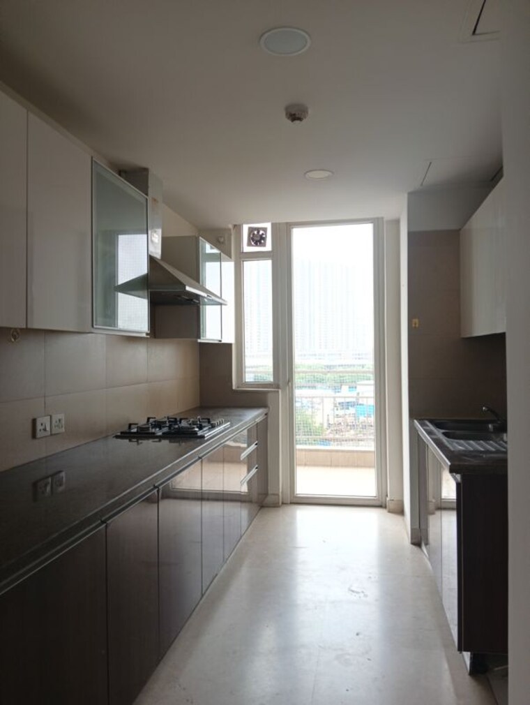 Kitchen, puri-diplomatic-greens-phase-i 3 Bedroom 1700 Sq.Ft. Apartment In Sector 111 Gurgaon 10580587