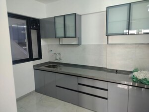 Kitchen in 2 BHK Apartment at Unique Youtopia, Kharadi – for Rent