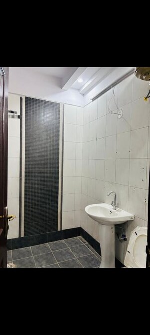 Bathroom in 3 BHK Builder Floor at Kanha Apartments Indirapuram, Shakti Khand 2 – for Rent