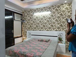 Bedroom in 4 BHK Builder Floor at Rajouri Garden – for Sale