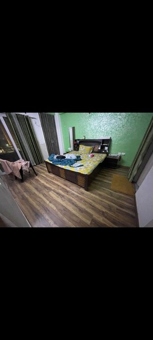 Bedroom in 2 BHK Apartment at Express Garden, Vaibhav Khand – for Rent