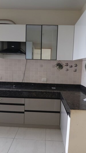 Kitchen in 4 BHK Apartment at Mahindra Aura, Sector 110a – for Sale