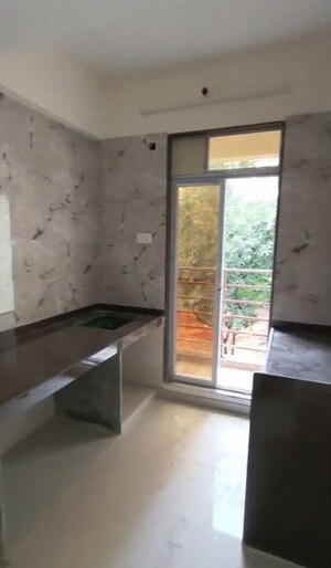 Kitchen in 1 BHK Apartment at Patel Meadows, Joveli – for Sale