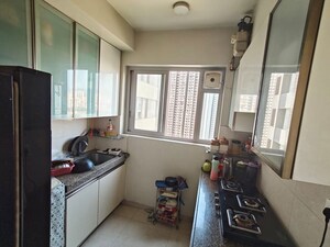 Kitchen in 2 BHK Apartment at Piramal Vaikunth, Balkum Pada – for Rent