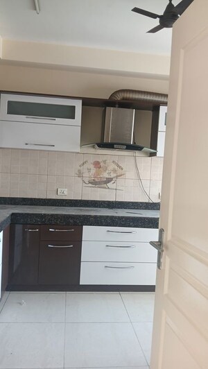 Kitchen in 3 BHK Apartment at Mahindra Aura, Sector 110a – for Sale
