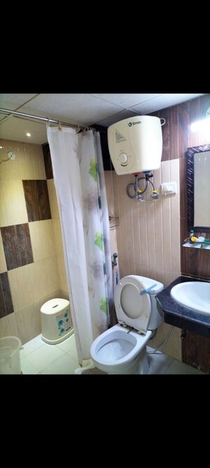 Bathroom in 4 BHK Builder Floor at Vasundhara Complex, Vasundhara Sector 16 – for Rent