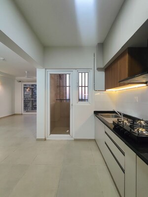 Kitchen in 2 BHK Apartment at Bhartiya Nikoo Homes Phase 2, Thanisandra Main Road – for Rent