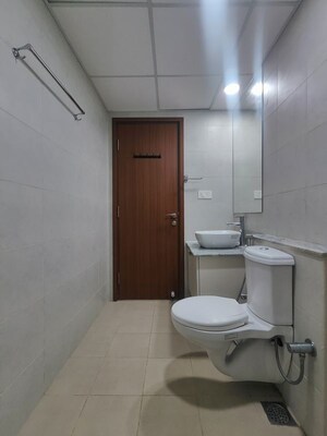Bathroom in 2 BHK Apartment at Bhartiya Nikoo Homes Phase 2, Thanisandra Main Road – for Rent