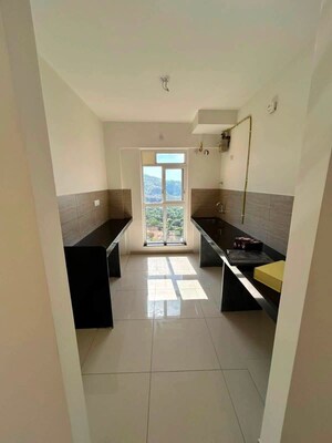 Kitchen in 2 BHK Apartment at Godrej Emerald, Ghodbunder Road – for Sale