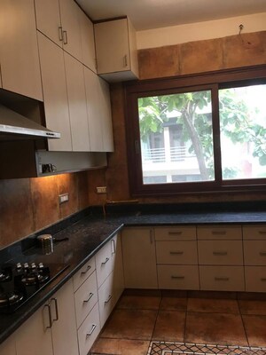 Kitchen in 4 BHK Apartment at Vasant Vihar – for Rent