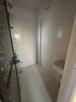 Bathroom in 1 BHK Apartment at Raunak Unnathi Greens, Kasarvadavali – for Rent