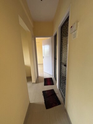Building Lobby in 1 BHK Apartment at Raunak Unnathi Greens, Kasarvadavali – for Rent