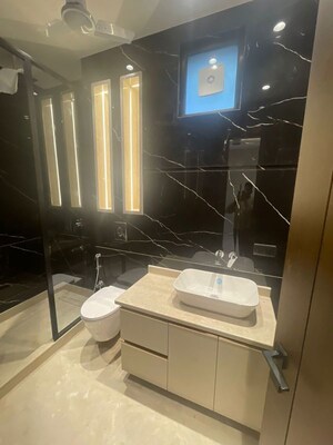 Bathroom in 3 BHK Apartment at Defence Colony – for Rent
