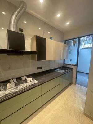 Kitchen in 3 BHK Apartment at Defence Colony – for Rent