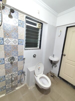 Bathroom in 1 BHK Apartment at Cosmos Orchid, Ghodbunder Road – for Sale