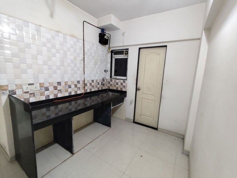 Kitchen, cosmos-orchid 1 Bedroom 450 Sq.Ft. Apartment In Ghodbunder Road Thane 10580947