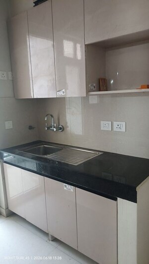 Kitchen in 2 BHK Apartment at Eldeco Live By The Greens, Sector 150 – for Rent