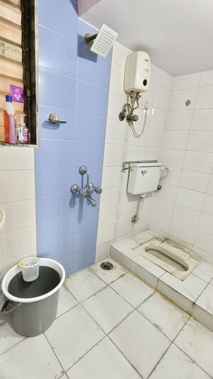Bathroom in 1 BHK Apartment at Riddhi Garden, Malad East – for Rent