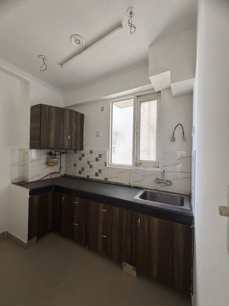 Kitchen, gaursons-ska-green-mansion 2 Bedroom 1095 Sq.Ft. Apartment In Sector 12 Greater Noida Greater Noida 10580613