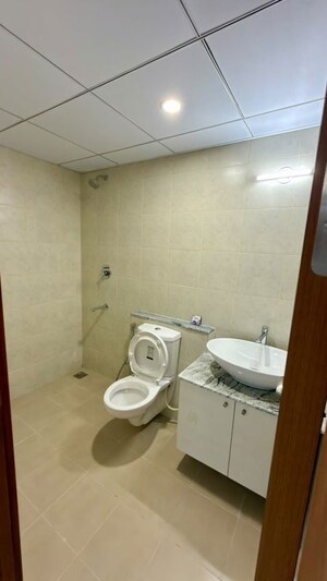 Bathroom in 2 BHK Apartment at Bhartiya City Nikoo Homes 4, Thanisandra Main Road – for Rent