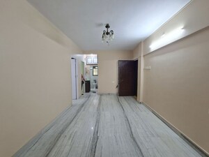 Living Room in 1 BHK Apartment at Evershine Nagar – for Rent