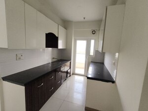 Kitchen in 2.5 BHK Apartment at Gulshan Vivante, Sector 137 – for Sale