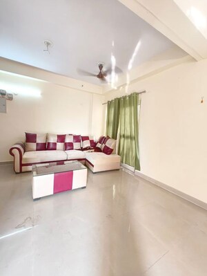 Living Room in 3.5 BHK Apartment at Aims Golf City, Sector 75 – for Rent