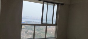 Room in 2 BHK Apartment at Lodha Amara, Kolshet Road – for Sale