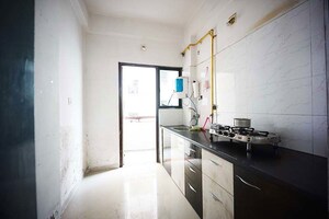 Kitchen in 2 BHK Apartment at Chandkheda – for Sale