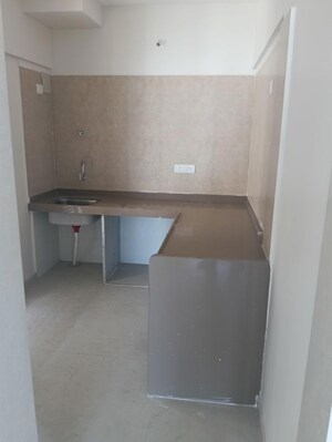 Kitchen in 2 BHK Apartment at Dosti West County, Balkum Pada – for Rent