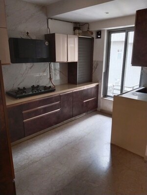 Kitchen in 3 BHK Apartment at Oberoi Realty Esquire, Goregaon East – for Rent