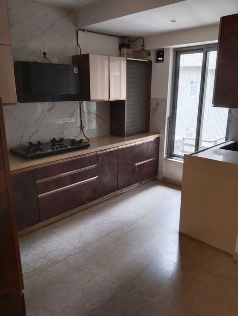 Kitchen, oberoi-realty-esquire 3 Bedroom 1450 Sq.Ft. Apartment In Goregaon East Mumbai 10581115