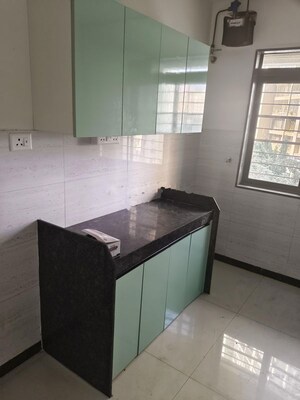 Kitchen in 2 BHK Apartment at Acme Ozone, Manpada – for Rent