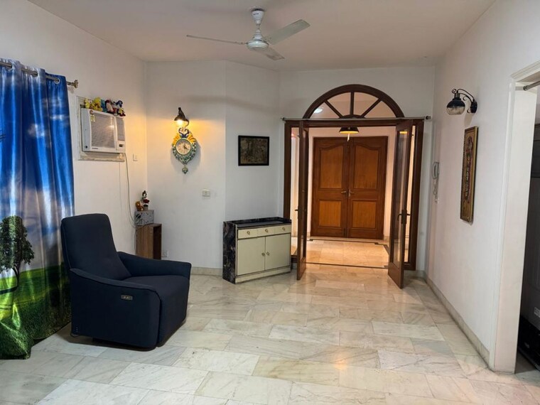 Living Room, kohli-one-housing-malibu-condominiums-high-rise 3 Bedroom 2450 Sq.Ft. Apartment In Sector 47 Gurgaon 10581163