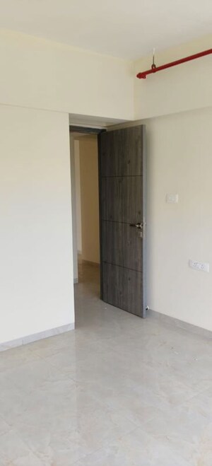 Room in 2 BHK Apartment at Group Satellite Elegance, Goregaon East – for Sale