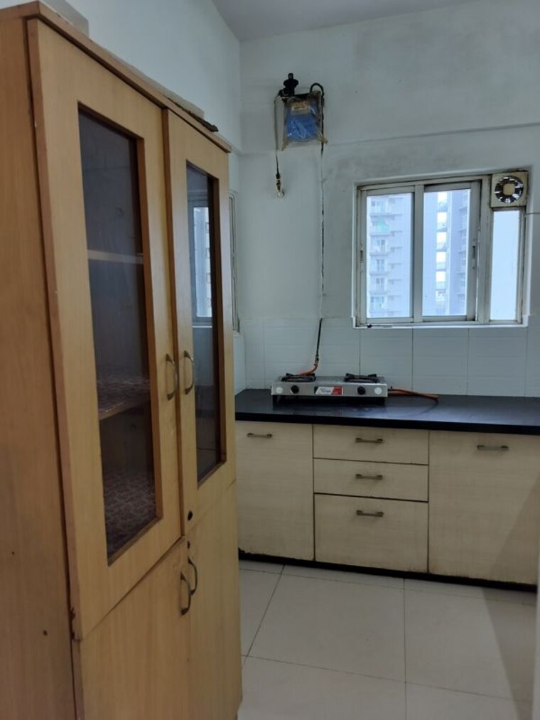 Kitchen, amanora-desire-tower 1 Bedroom 530 Sq.Ft. Apartment In Magarpatta Road Pune 10581265